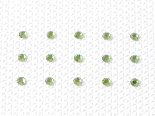 Peridot Individual Body Art Crystals 2.9 mm wide stones, 15 self-adhesive stones per strip